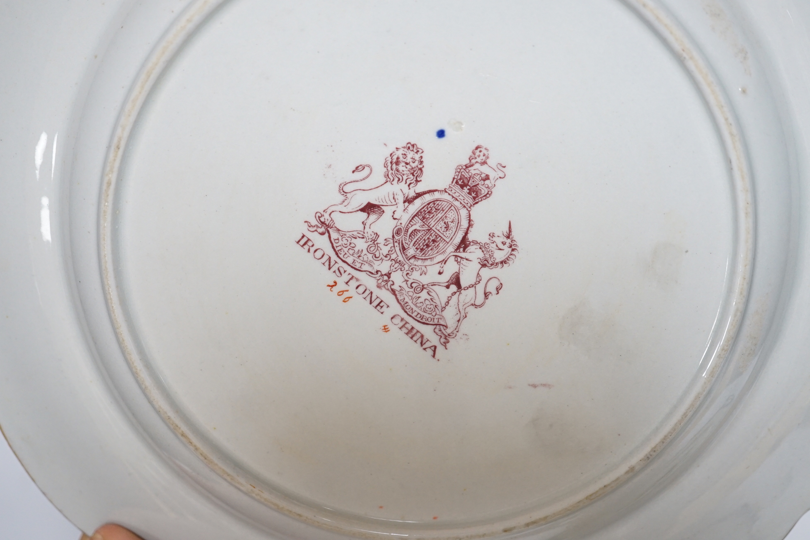 Two late 18th century pearlware Prattware plates, a Chinese export plate and an ironstone plate, largest 27cm in diameter
